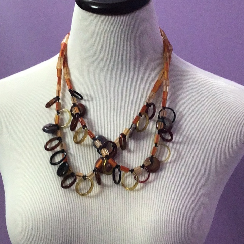 Modern Women’s Plastic Glass with Various Color & Size Rings & Donut Gemstones?